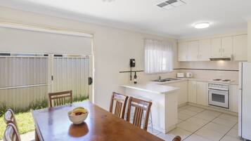 Standard Apartment, 2 Bedrooms, Non Smoking | Private kitchen | Fridge, microwave, coffee/tea maker, electric kettle