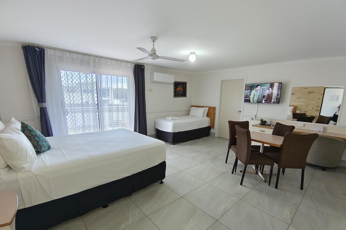 Suite, Multiple Beds, Non Smoking, Balcony | 1 bedroom, in-room safe, desk, blackout curtains