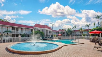 Outdoor pool, open 9 AM to 10:00 PM, sun loungers