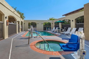 Seasonal outdoor pool, open 6 AM to 10:30 PM, pool umbrellas