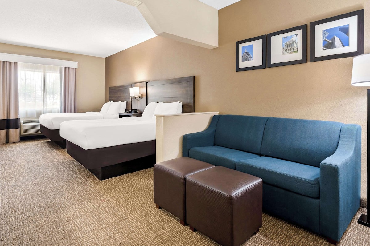 suite, 2 queen beds, non smoking | premium bedding, desk, iron/ironing board, free cots/infant beds