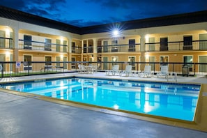Seasonal outdoor pool, pool loungers