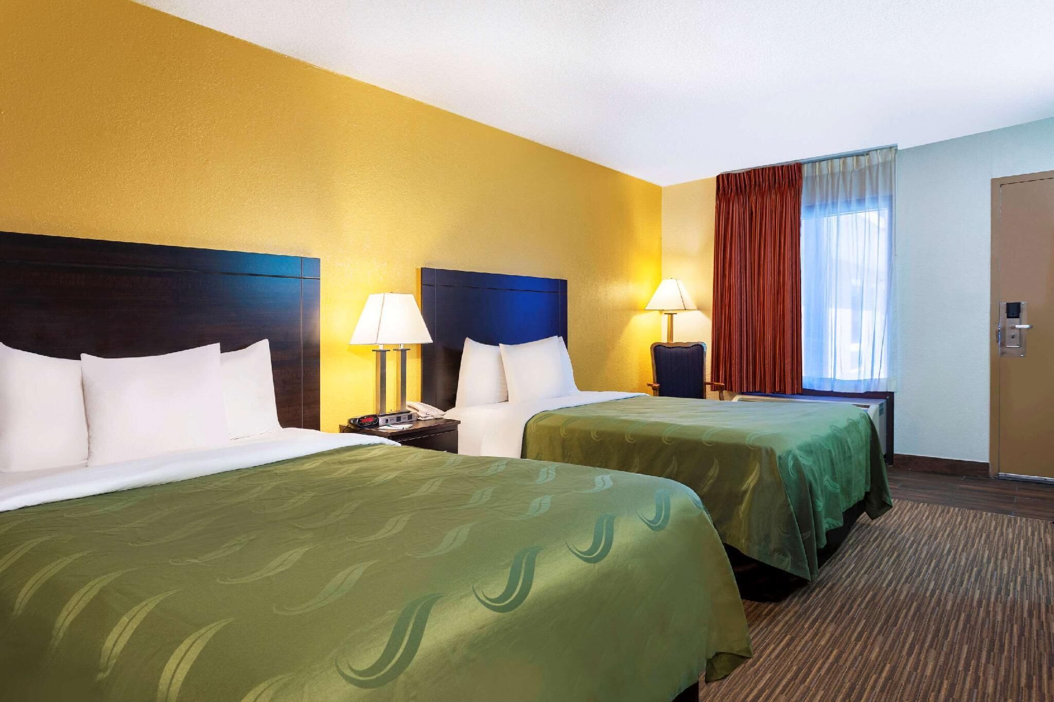 Desk, laptop workspace, blackout drapes, iron/ironing board