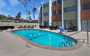 Outdoor pool, pool umbrellas, sun loungers