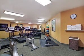 A gym with treadmills, elliptical machines, and free weights. - Holiday Inn Express Port Hueneme by IHG (Port Hueneme)