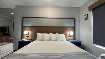 Deluxe Suite, 1 King Bed, Non Smoking | Premium bedding, down comforters, pillowtop beds, blackout drapes