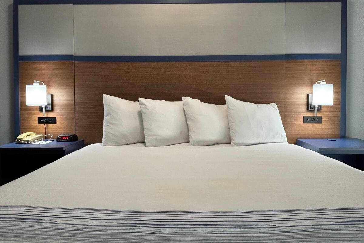 Premium bedding, down duvets, pillow-top beds, blackout curtains