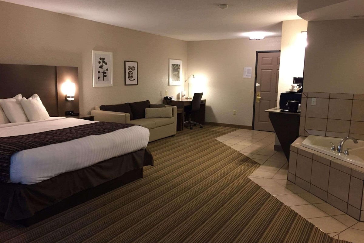 1 bedroom, desk, blackout curtains, iron/ironing board