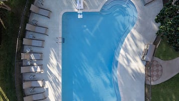 Seasonal outdoor pool, open 6:00 AM to 10:00 PM, pool umbrellas