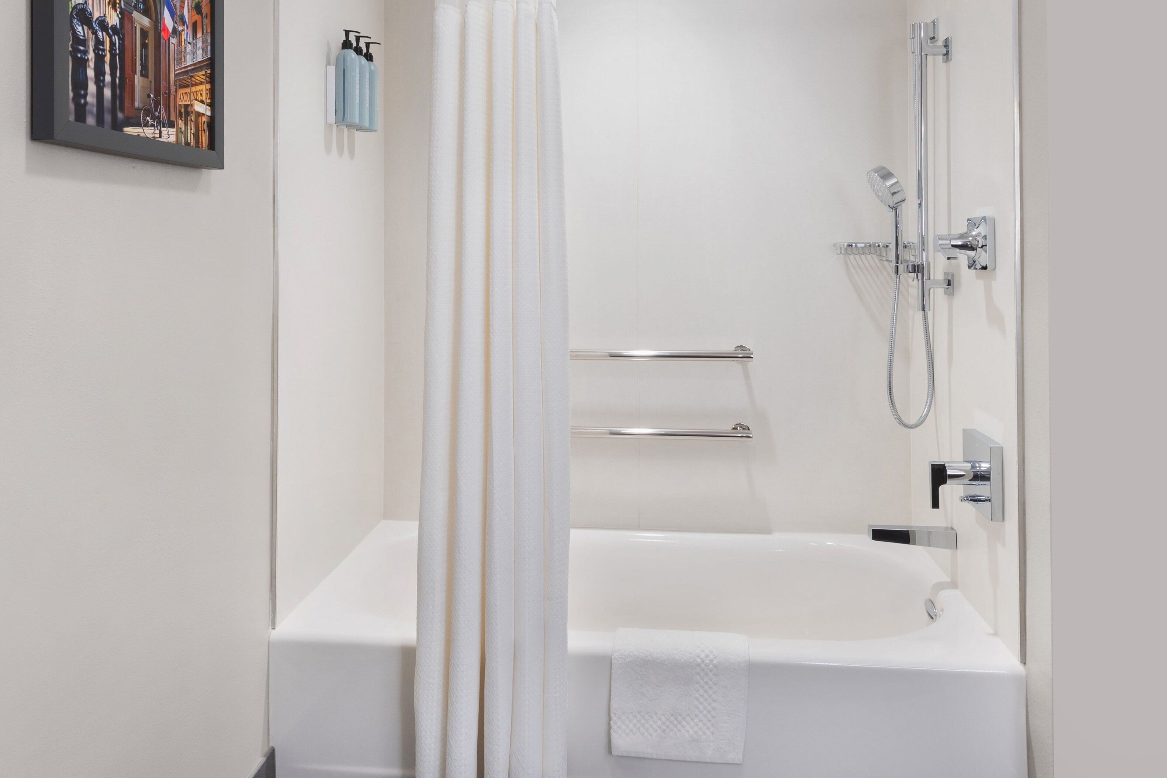 combined shower/bathtub, free toiletries, hair dryer, towels