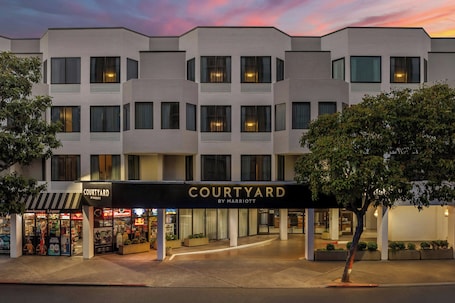 A multi-story hotel with a flat facade, large windows, and a sign reading 'COURTYARD BY MARRIOTT.'. Courtyard by Marriott San Francisco Fisherman's Wharf