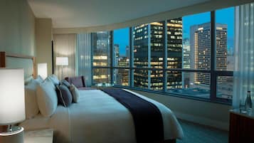 Hypo-allergenic bedding, down duvets, pillow-top beds, in-room safe
