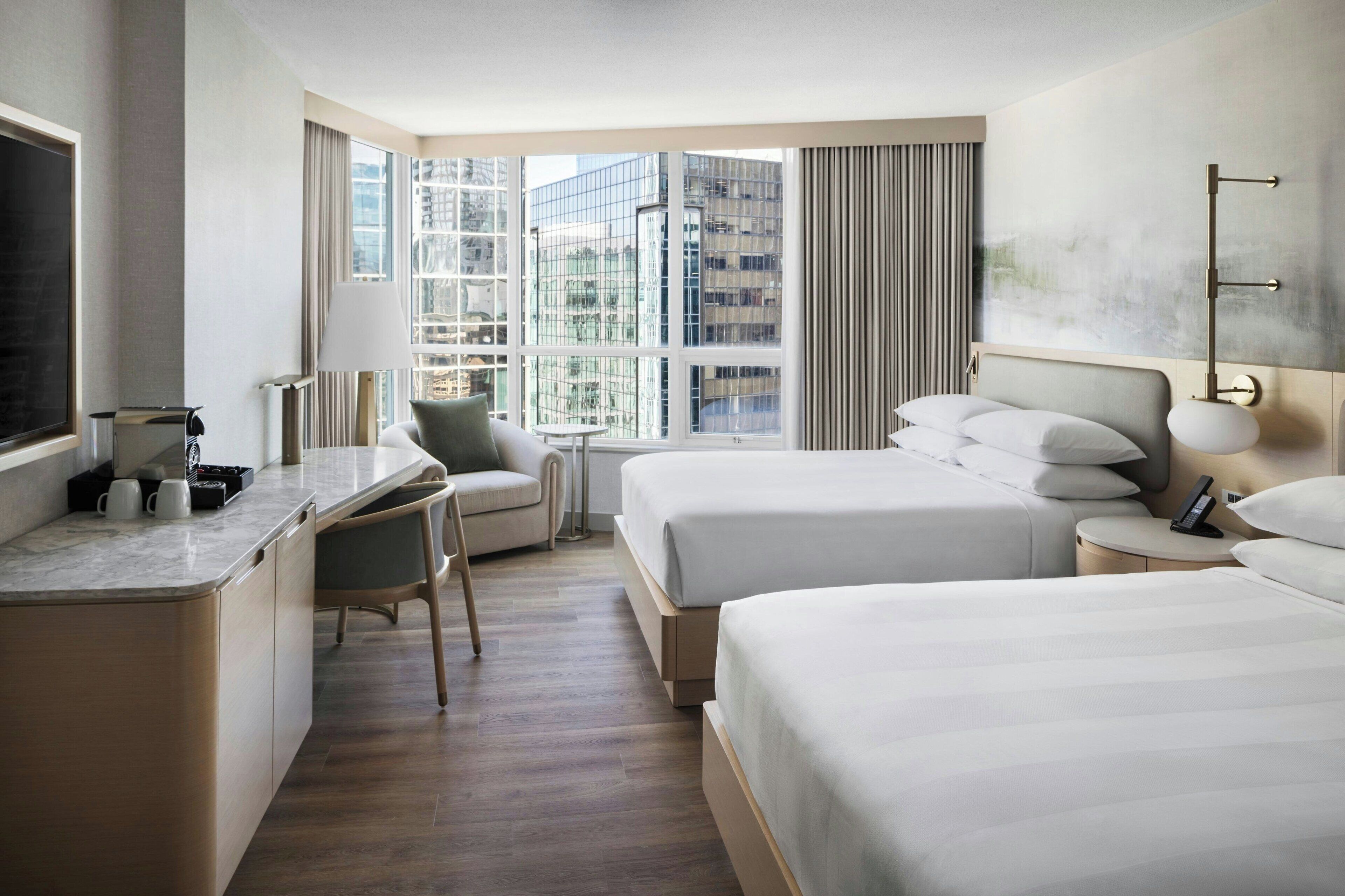 hypo-allergenic bedding, down duvets, pillow-top beds, in-room safe