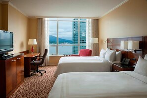 Hypo-allergenic bedding, down comforters, pillowtop beds, in-room safe