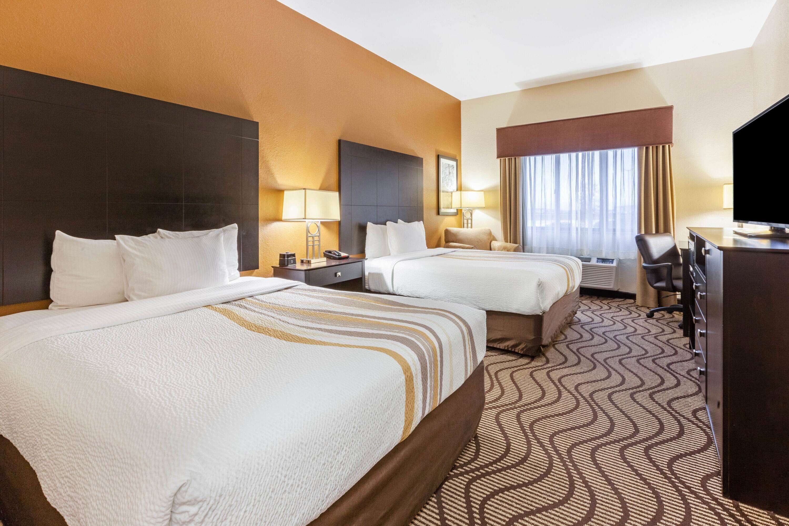 premium bedding, desk, blackout curtains, iron/ironing board