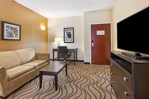 Premium bedding, desk, blackout curtains, iron/ironing board