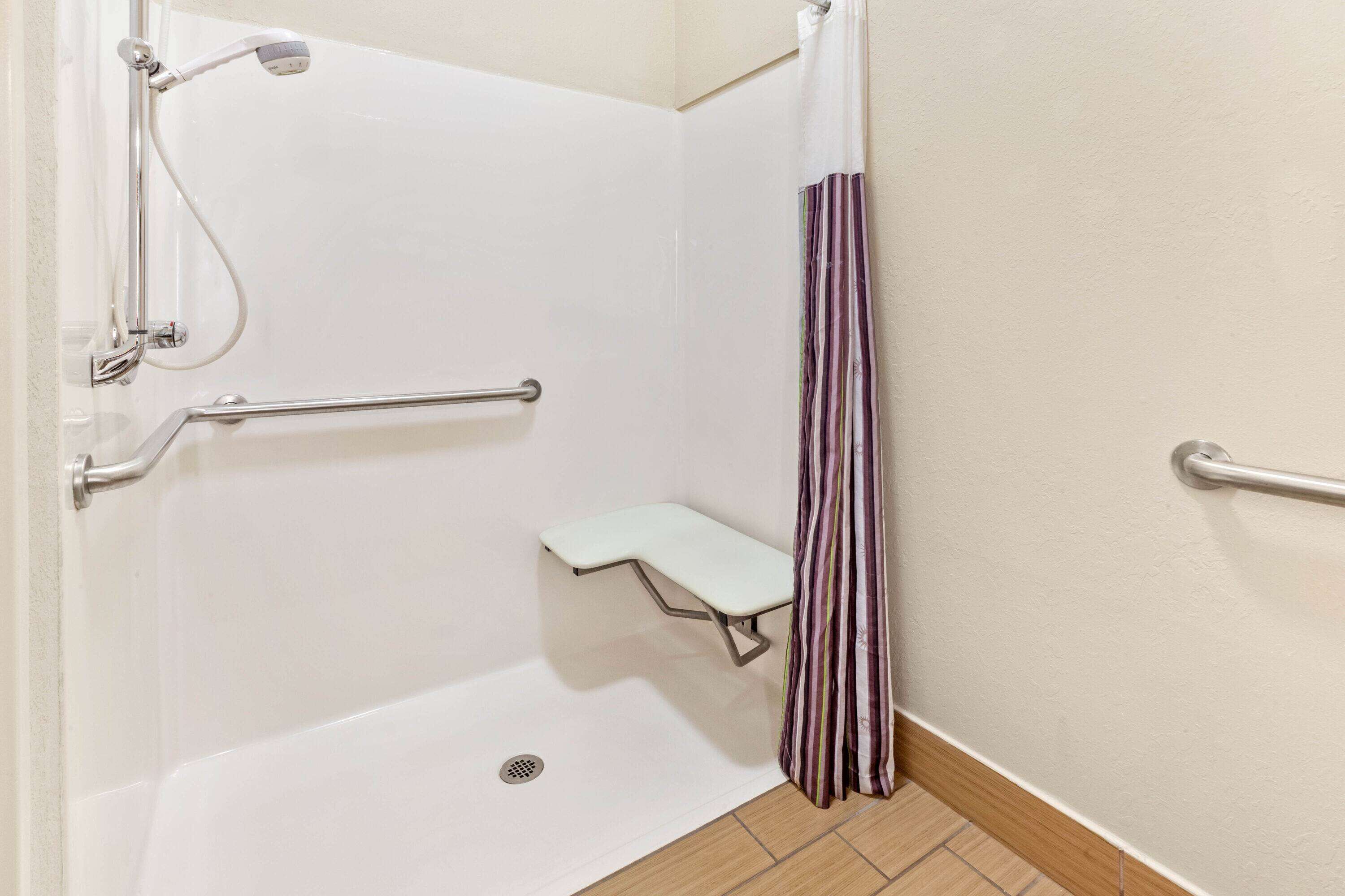 combined shower/bathtub, free toiletries, hair dryer, towels