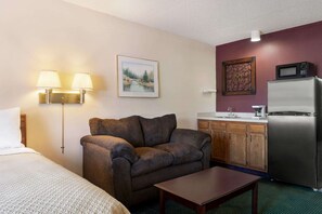 Individually furnished, desk, laptop workspace, iron/ironing board