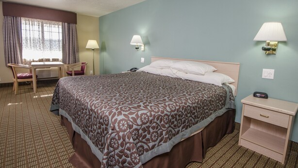 Iron/ironing board, cribs (free), WiFi (free), bed sheets