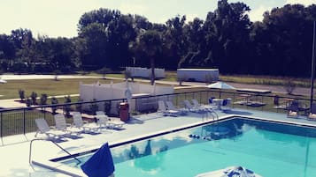 Outdoor pool, pool umbrellas, sun loungers