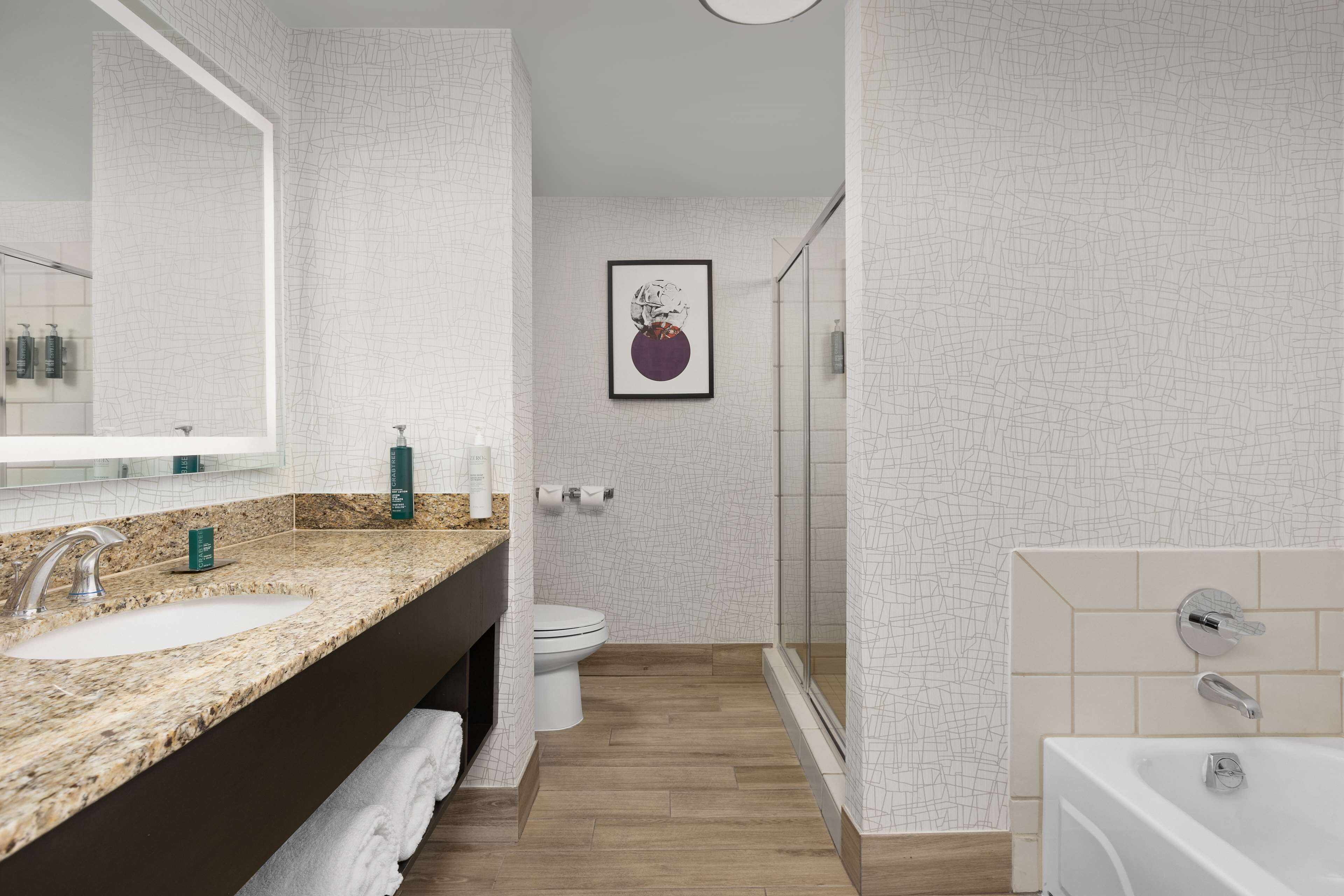 separate bathtub and shower, free toiletries, hair dryer, towels