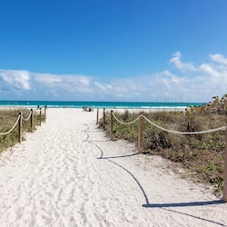 On the beach, sun-loungers, beach umbrellas, beach towels