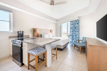 Studio 1 Queen With Balcony | Private kitchen | Fridge, microwave, oven, stovetop at Hilton Vacation Club The Cove on Ormond Beach