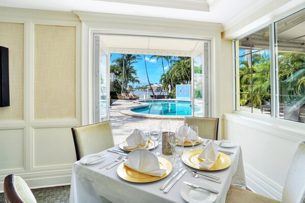 Breakfast, lunch, dinner served; pool views