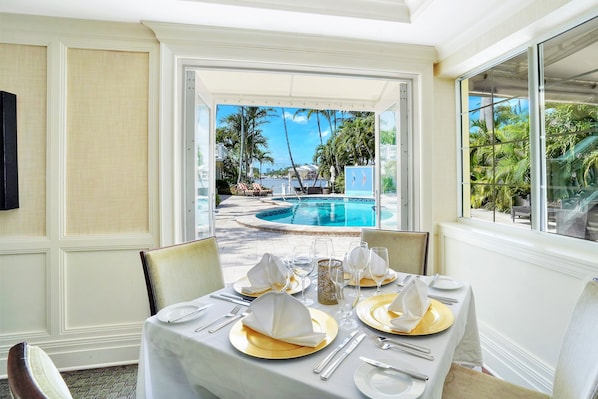 Breakfast, lunch, dinner served; pool views