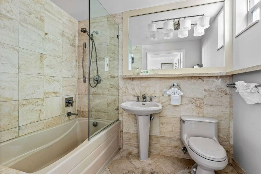 the intracoastal suite | bathroom | shower, designer toiletries, hair dryer, bathrobes