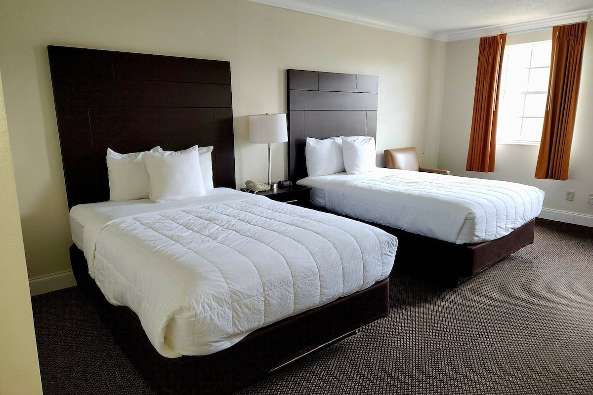 standard room, 2 double beds | desk, laptop workspace, blackout curtains, free wifi