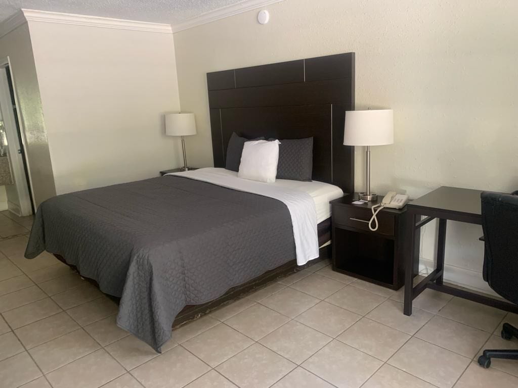 desk, laptop workspace, blackout curtains, free wifi