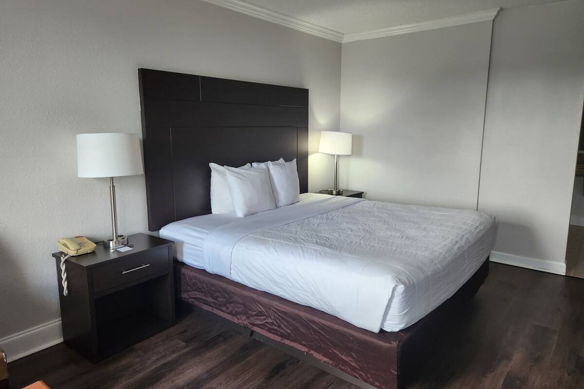 desk, laptop workspace, blackout curtains, free wifi