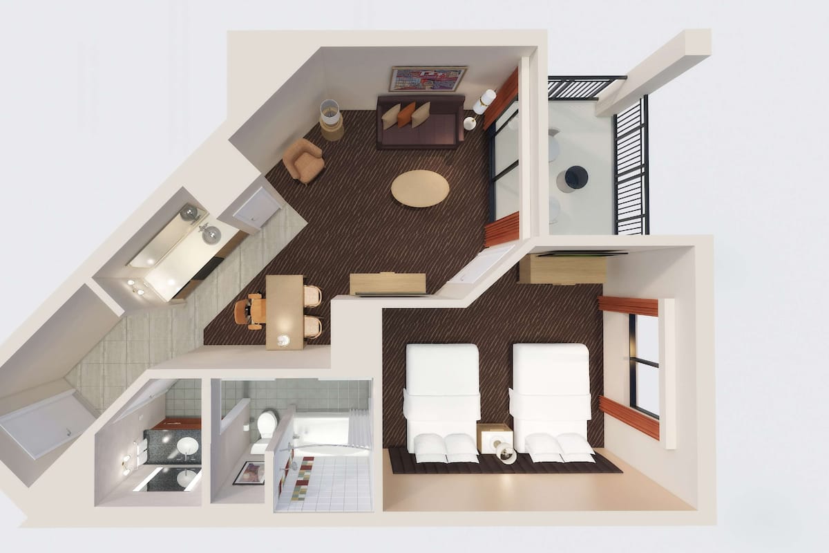 Disposição de quarto de hotel com cama, área de estar, cozinha compacta, banheiro e varanda.