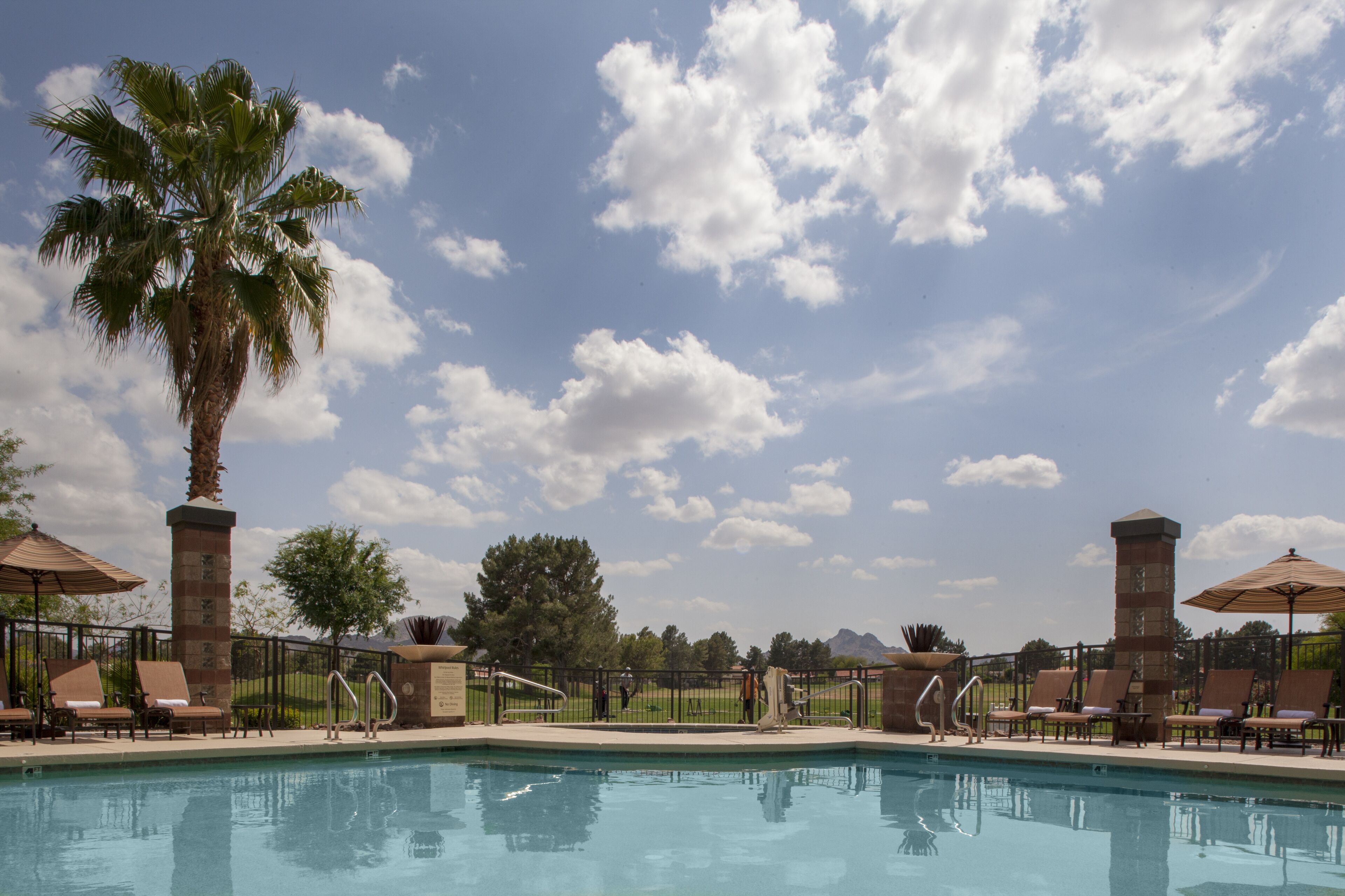 outdoor pool, open 8:30 am to 9:30 am, pool umbrellas