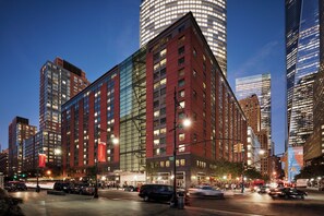 Situated in a bustling urban environment, this hotel offers a contemporary design with a clear view of the surrounding cityscape.