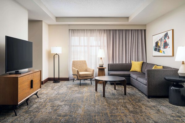 Presidential Suite, 1 King Bed | Living area | 55-inch LCD TV with cable channels, Smart TV, pay movies