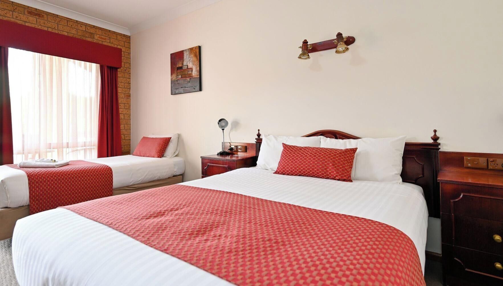 Desk, laptop workspace, iron/ironing board, rollaway beds