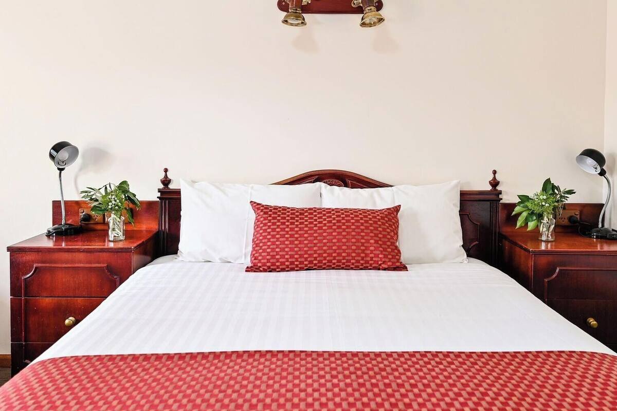 Desk, laptop workspace, iron/ironing board, rollaway beds