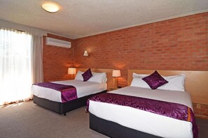 Standard Quadruple Room, 2 Queen Beds | 1 bedroom, minibar, desk, soundproofing