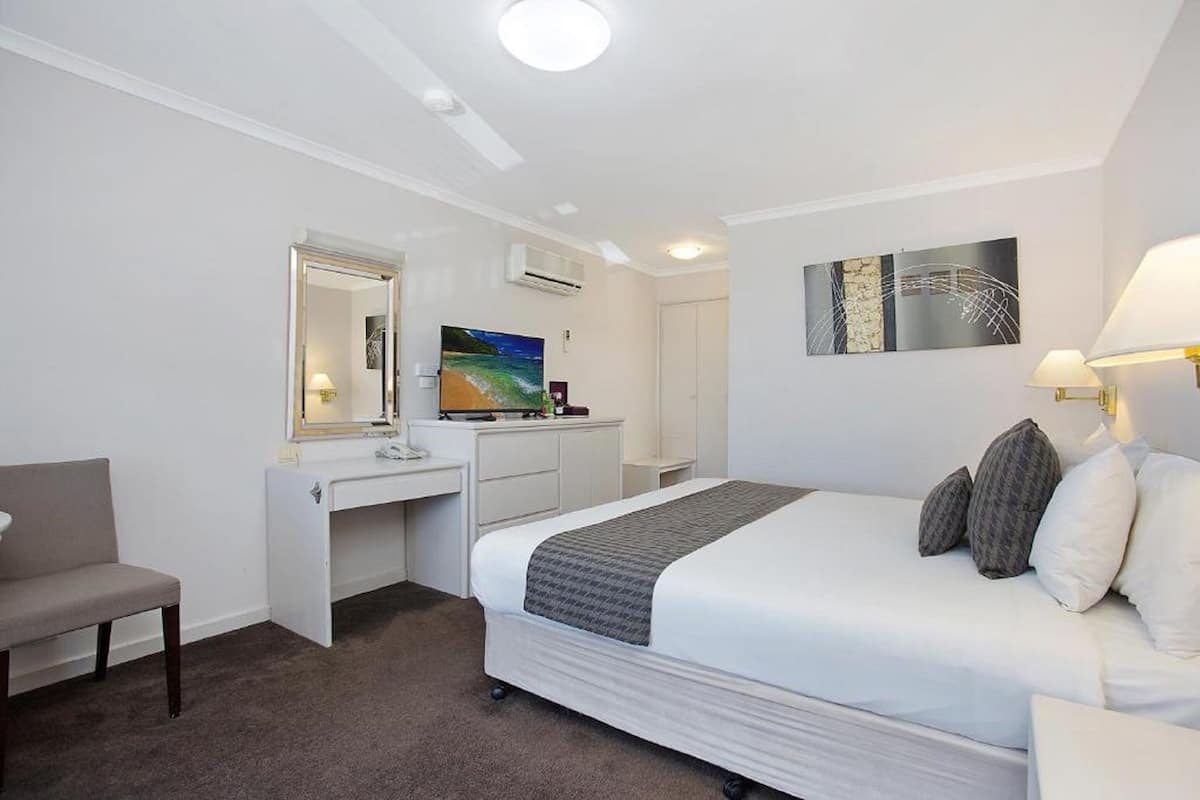 Luxe beddengoed, een minibar, een strijkplank/strijkijzer, gratis wifi