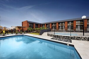 Outdoor pool, open 7:00 AM to 9:00 PM, sun loungers