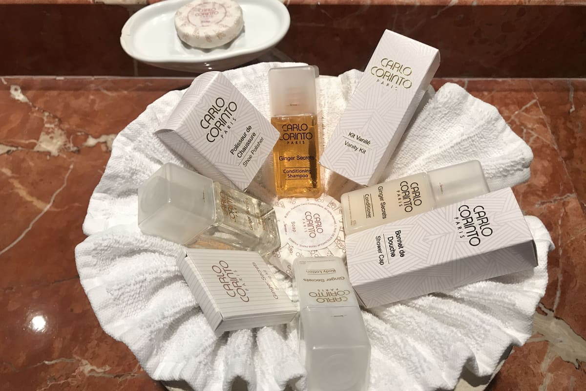 separate bathtub and shower, deep-soaking bathtub, designer toiletries