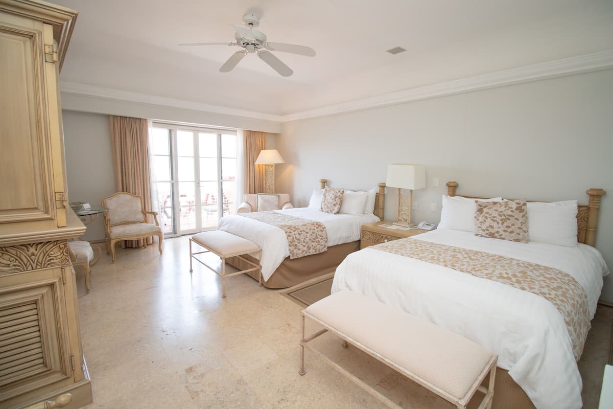 Premium bedding, down duvets, pillow-top beds, free minibar items