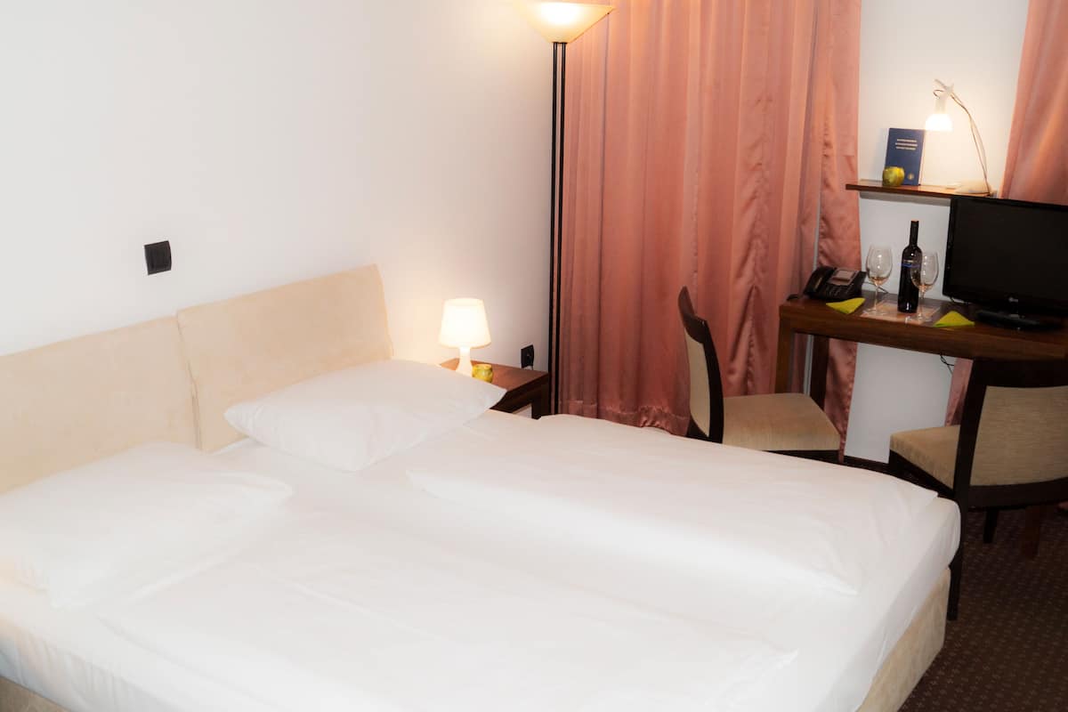 In-room safe, desk, iron/ironing board (on request), cribs (free)