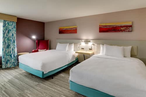 Suite, 2 Queen Beds, Accessible (Roll-in Shower) | Desk, laptop workspace, iron/ironing board, free WiFi