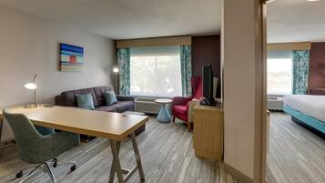 Suite, 1 King Bed | Desk, laptop workspace, iron/ironing board, free WiFi