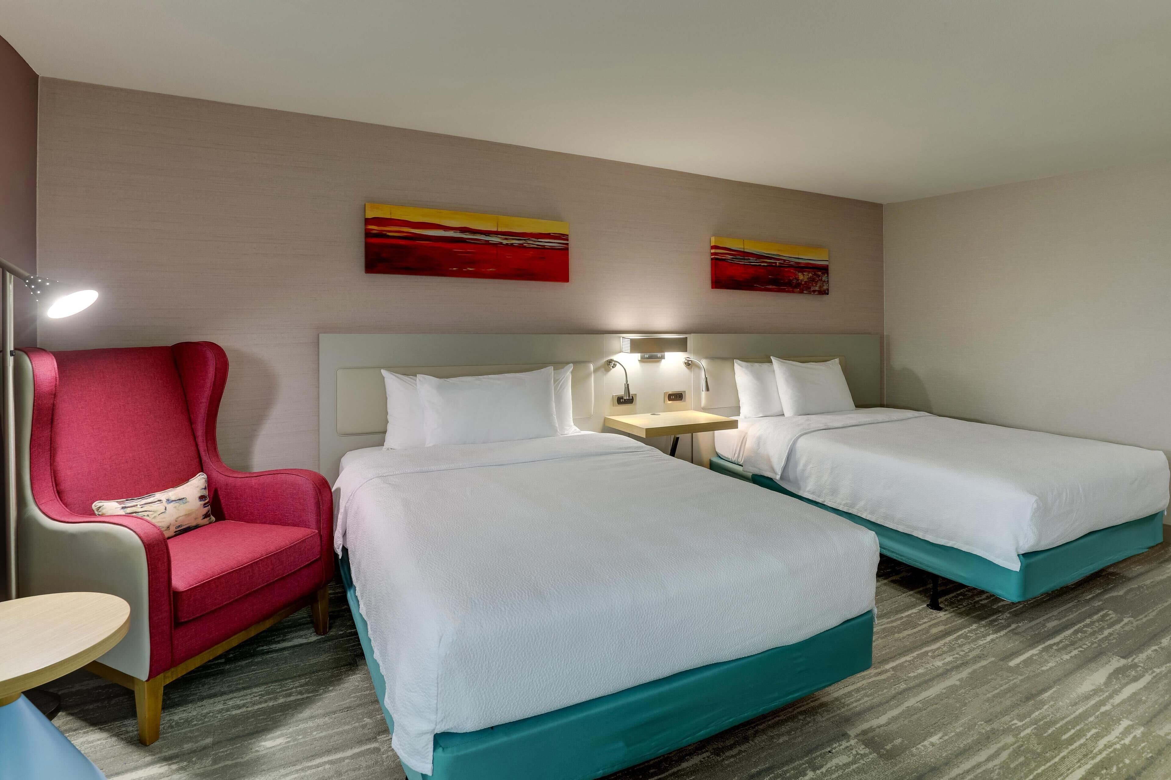 Suite, 2 Queen Beds, Accessible (Roll-in Shower) | Desk, laptop workspace, iron/ironing board, free WiFi