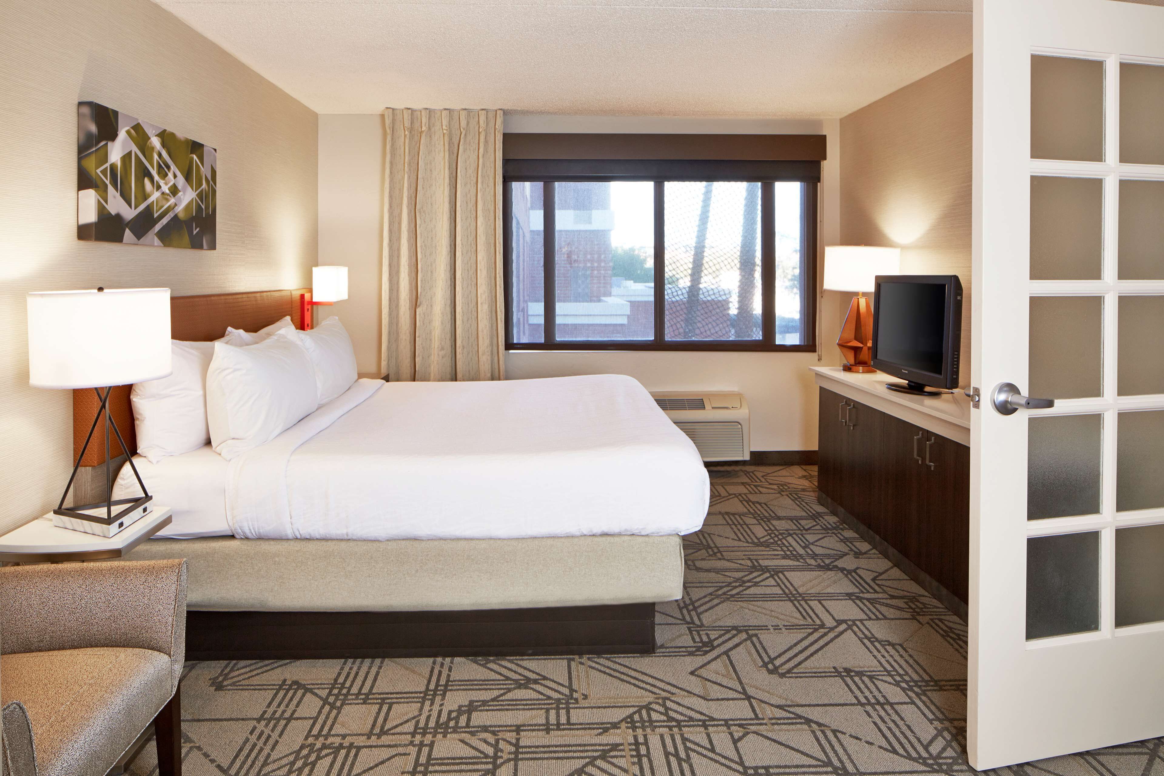 premium suite, 1 king bed | in-room safe, desk, laptop workspace, soundproofing