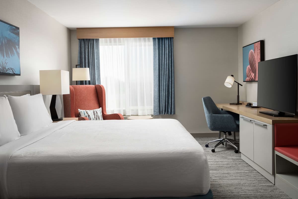 Hypo-allergenic bedding, desk, laptop workspace, iron/ironing board